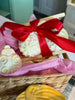 Butter rum soap ornaments. Placed on a bamboo soap dish. A small heart sponge slipped into the center. Finished with red satin ribbon