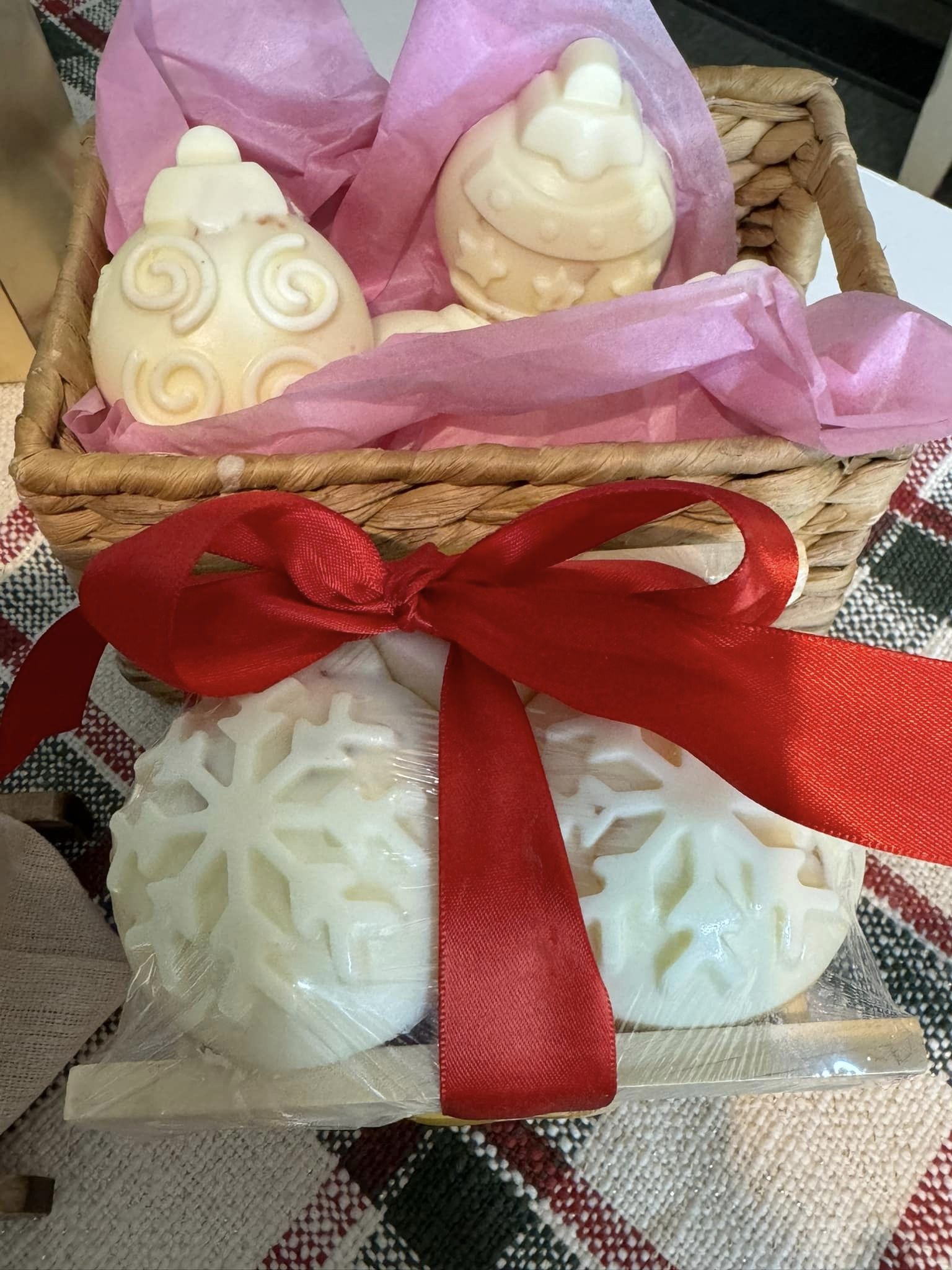 Butter rum soap ornaments. Placed on a bamboo soap dish. A small heart sponge slipped into the center. Finished with red satin ribbon